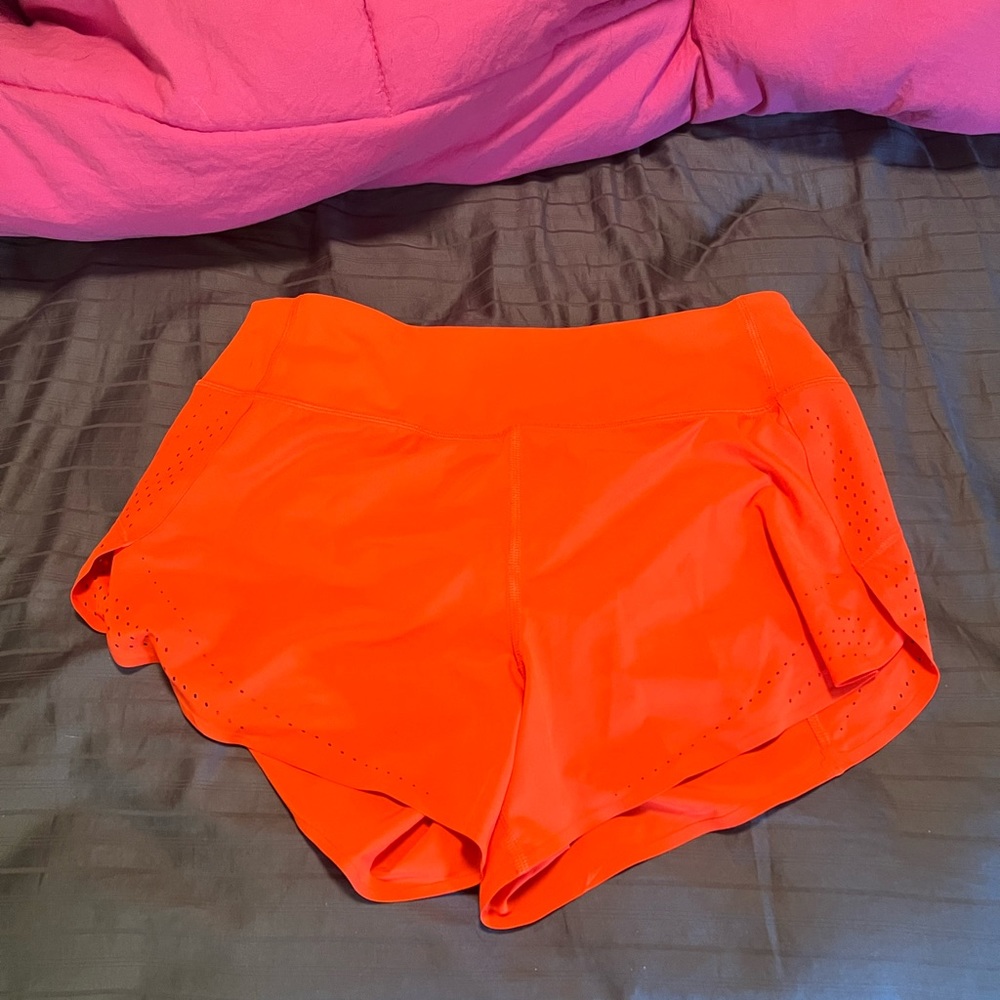 Bright orange Athleta shorts